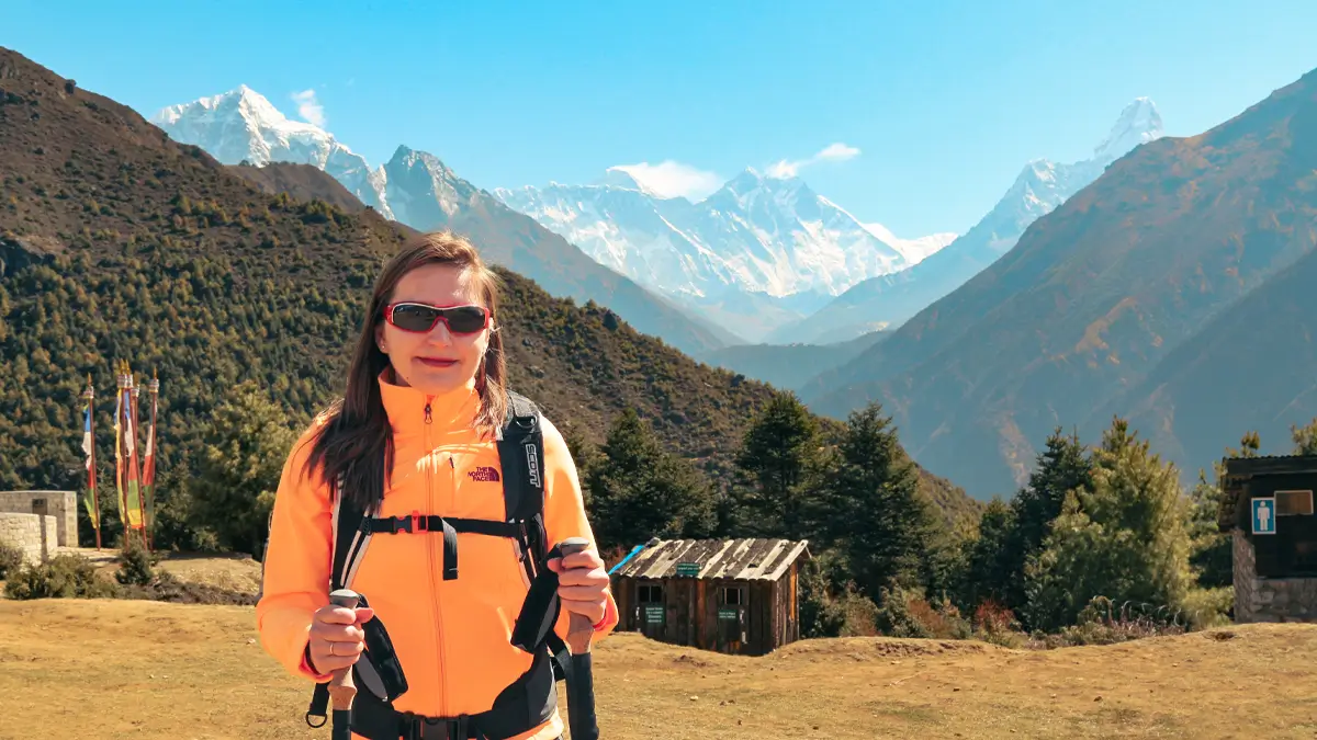 Happy female trekker on Everest Base Camp Trail