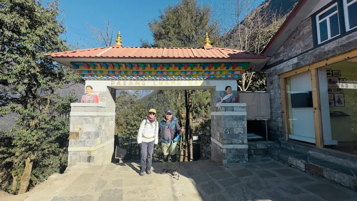 Trekkers entering Pasang Lhamu Gate in Lukla, first steps on the Everest Base Camp trek
