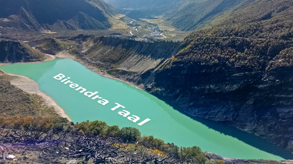 Birendra Lake acclimatization hike at 3,691 meters on Manaslu Circuit trek with mountain reflections