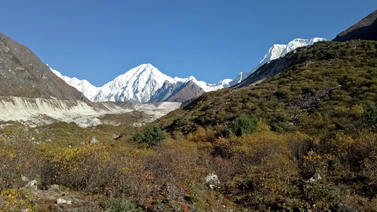 Manaslu Circuit trekking trail through Himalayan landscape with mountain peaks and teahouse villages